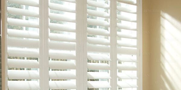 Indoor Shutters, quality and affordable window treatments, in living room in Panama City Florida