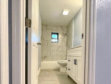 Bright, Modern and Minimalist bathroom renovation