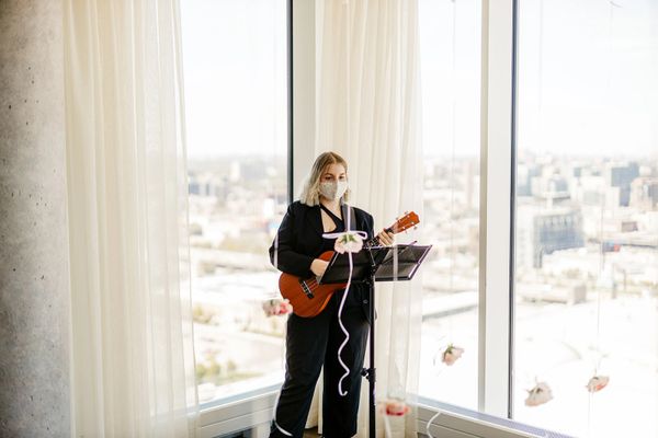 Ukulele player at wedding proposal
