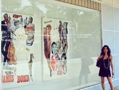 Eurydice Eve w her handstitched collages of vintage movie posters: James Bond Age, Female Animal