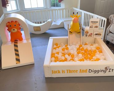 Indoor soft play set-up. Construction themed birthday. Ball pit, and soft play toys
