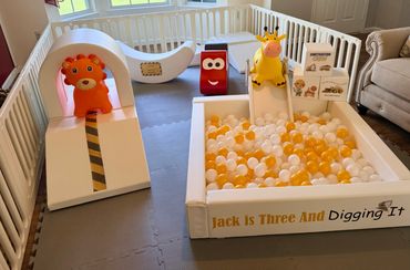 Indoor soft play set-up. Construction themed birthday. Ball pit, and soft play toys