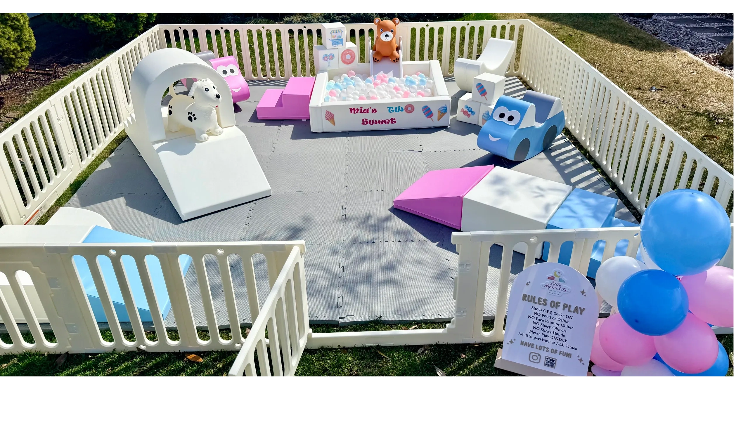 A colorful and safe outdoor play space with soft play toys for sliding, climbing, and exploring for toddlers. Two Sweet theme.