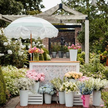 Flower cart at Woodward park with seasonal blooms