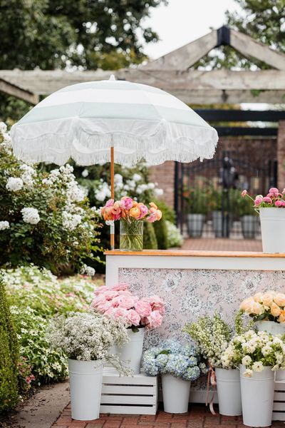 A flower cart set up with roses and more in Tulsa