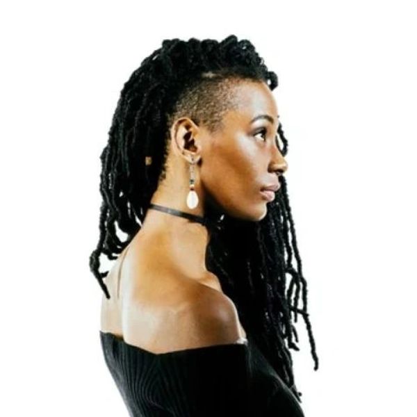 Side view of a woman with locs