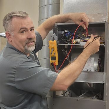 The owner fixing an HVAC unit.
