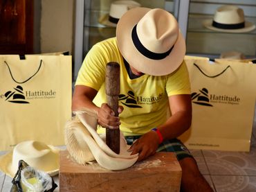 Hammering the hats after the rematadora and azocadora have done their jobs.