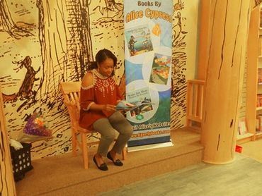 Alice reading a book