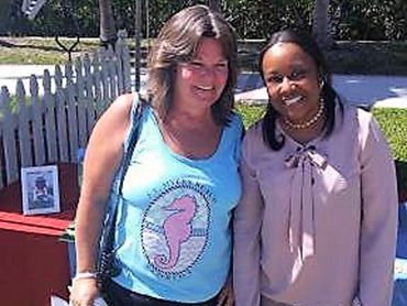 Both women are smiling