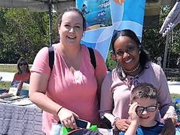 Alice with other person and a boy