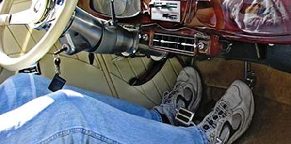 After installing Steer Clear in his Foose-built 34
Ford, 6' 7" Ray has enough room to stretch his
le