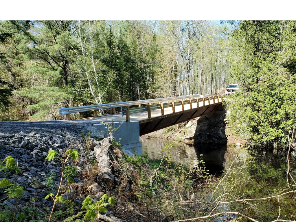 The construction of this 40-ton bridge opened up at 25 acre parcel of water-front property.