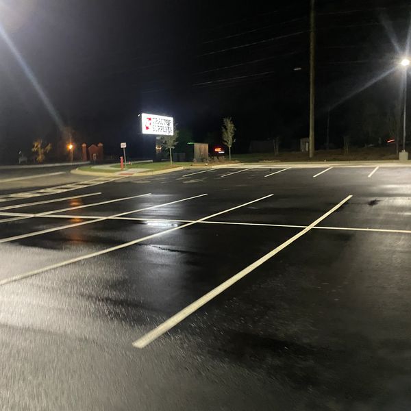 Here’s an Asphalt cleaning we did at a local tractors supply.