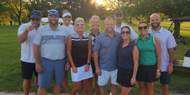 group of golfers on golf course