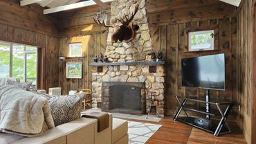 Enjoy quiet evens watching TV on the 55" 4K LED. Make friends with Bruce the Moose.