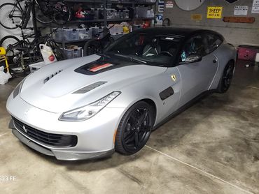 Custom Lusso Ferrari hood in carbon fiber