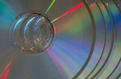 Stack of CDs from Banded Moon Arts and Media. We convert many types of tape to/from CD, DVD or more.