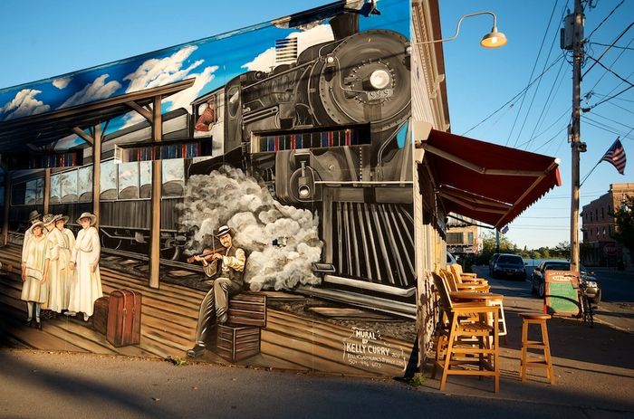 Located in Clayton NY on the side the Koffee Kove, this mural depicts a local train scene from 1919