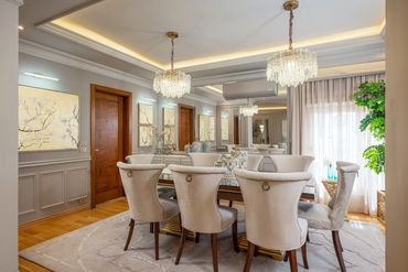 Dining room under a ring chandelier, Dokki apartment — تصميم غرف سفرة
