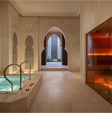 Hammam and sauna corridor with fretwork screens — سبا وتصميم صحي