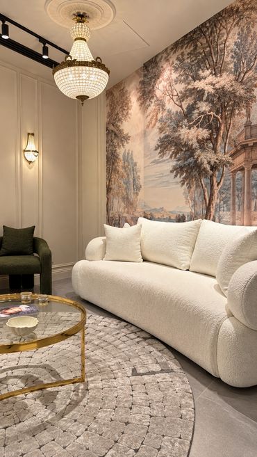 Waiting lounge, scenic mural and crystal chandelier - Deasalus Clinic, Mivida - تصميم عيادات