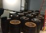 Whiskey Barrels with epoxy top and trash can insert