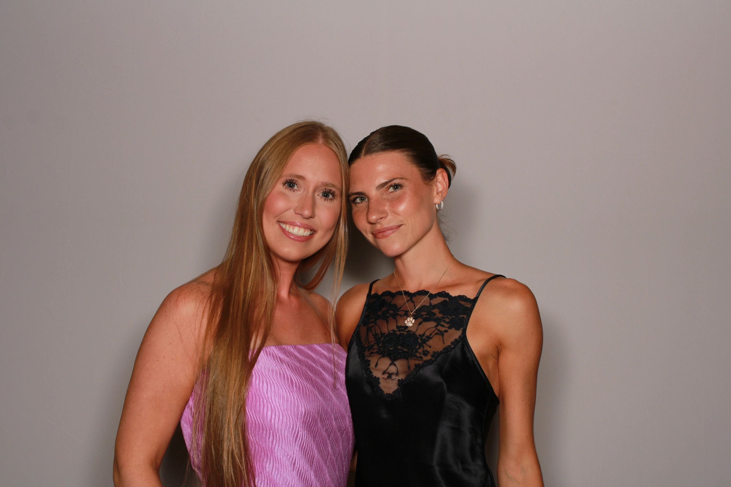 Classmates pose in the photo booth at their graduation banquet in Scottsdale, AZ