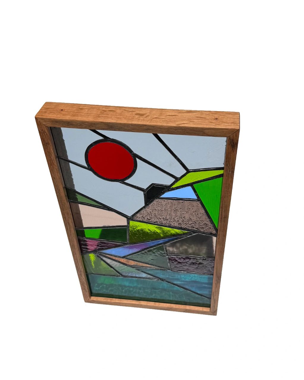 Stained glass panel in oak.