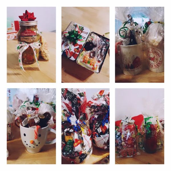 Christmas-themed gift jars and mugs filled with treats, decorated festively.