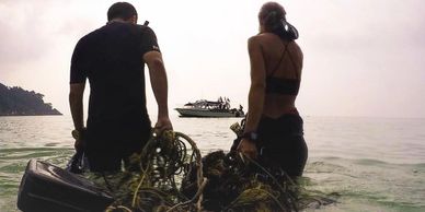 Scuba diving while cleaning the water