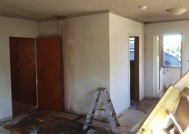 before photo apartment renovation structural wall removal builder kitchen new wall beam support