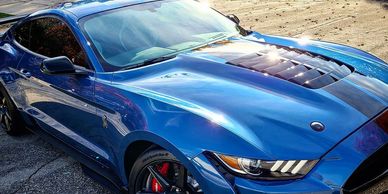 One-of-a-kind Shelby GT 500 Blue with black rally stripe. Carbon fiber wheels and trim.