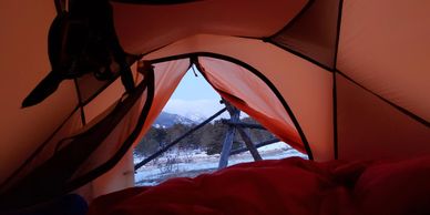 view of mountains from inside of big agnes tent in rocky mountain national park