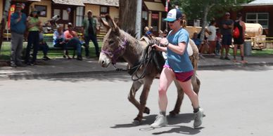 bottomless backpacks pack burro race in creede co