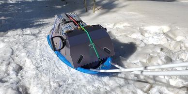 a pulk sled in snow