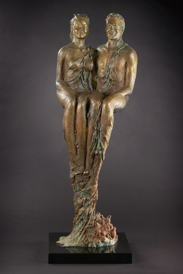 A picture of a sculpture of a man and a woman