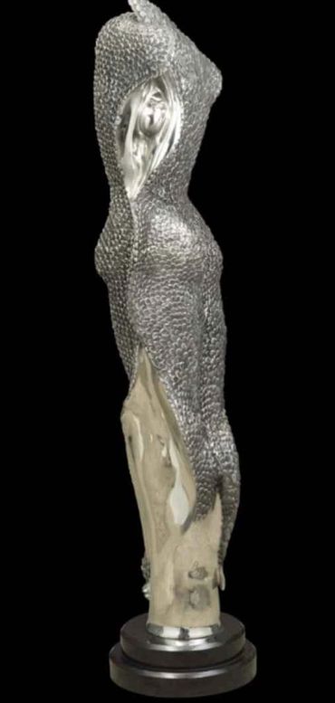 A picture of a sculpture in a black background