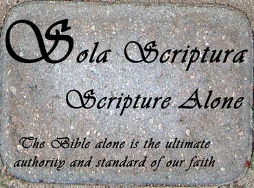 Stone plaque with the phrase 'Sola Scriptura - Scripture Alone'.