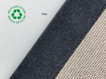 Close-up of recycled cotton fabric in Flint color with recycling logo.