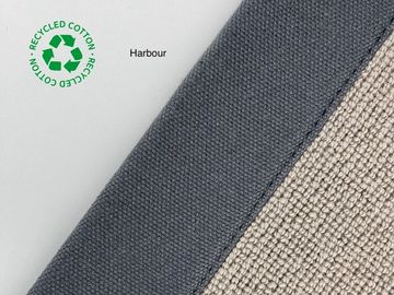 Close-up of recycled cotton fabric in grey and beige tones labeled 'Harbour'.