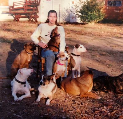 Phyllis with her pack of dogs circa 1989