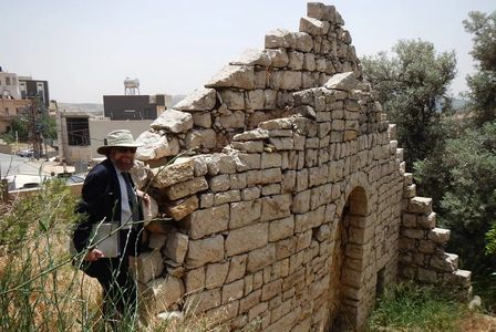 Dr. Hurtak next to the old Church in Majdal Shams.