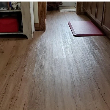 New luxury vinyl plank flooring through kitchen and guest bathroom