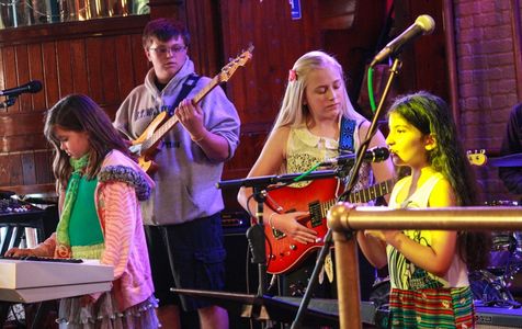 Pensacola music students show their guitar lessons, piano lessons, and voice lessons in live show