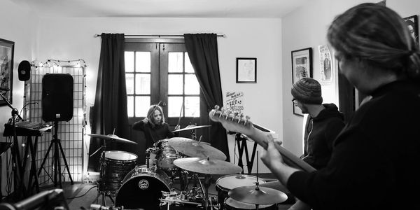 Pensacola music school Gulf Coast School of Music practices drum lessons for annual student show