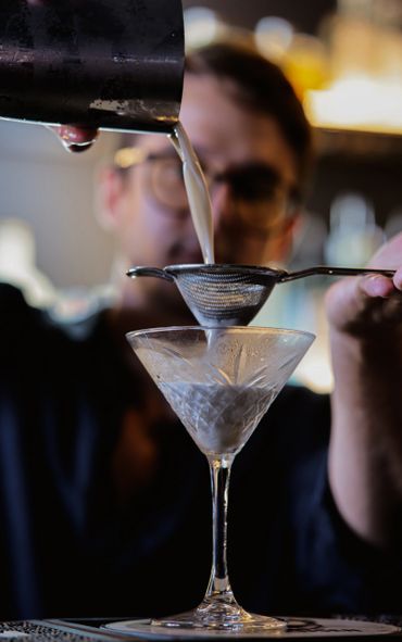 filtering espresso martini cocktail