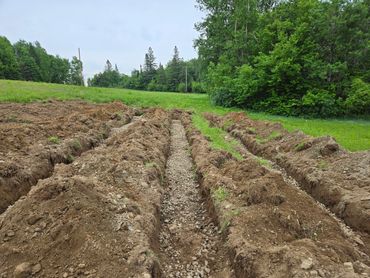 Stone and pipe trenches.