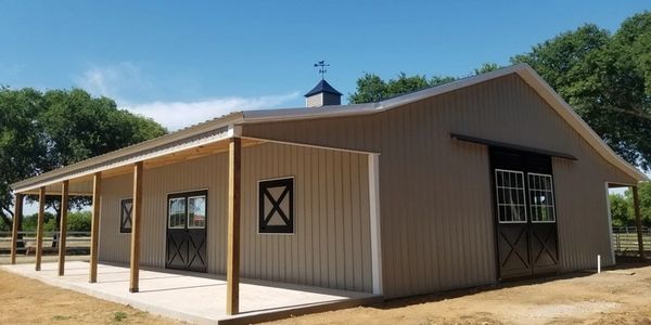 Texwin horse barn with 2 lean to porches.