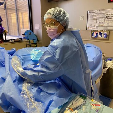 Jade Miller in a sterile procedure placing a Peripherally Inserted Central Catheter by ultrasound.